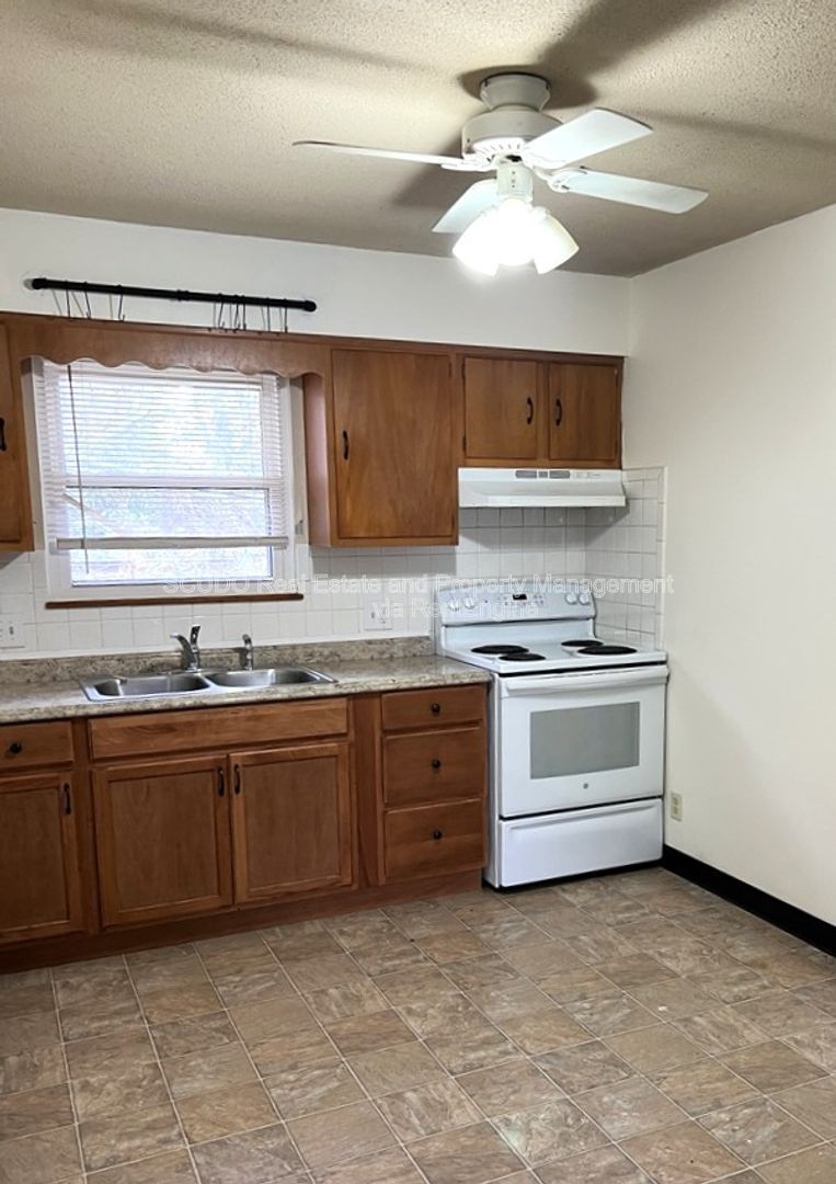 Bright & Cozy 2-Bedroom Home with Large Backyard & Attached Garage! property image