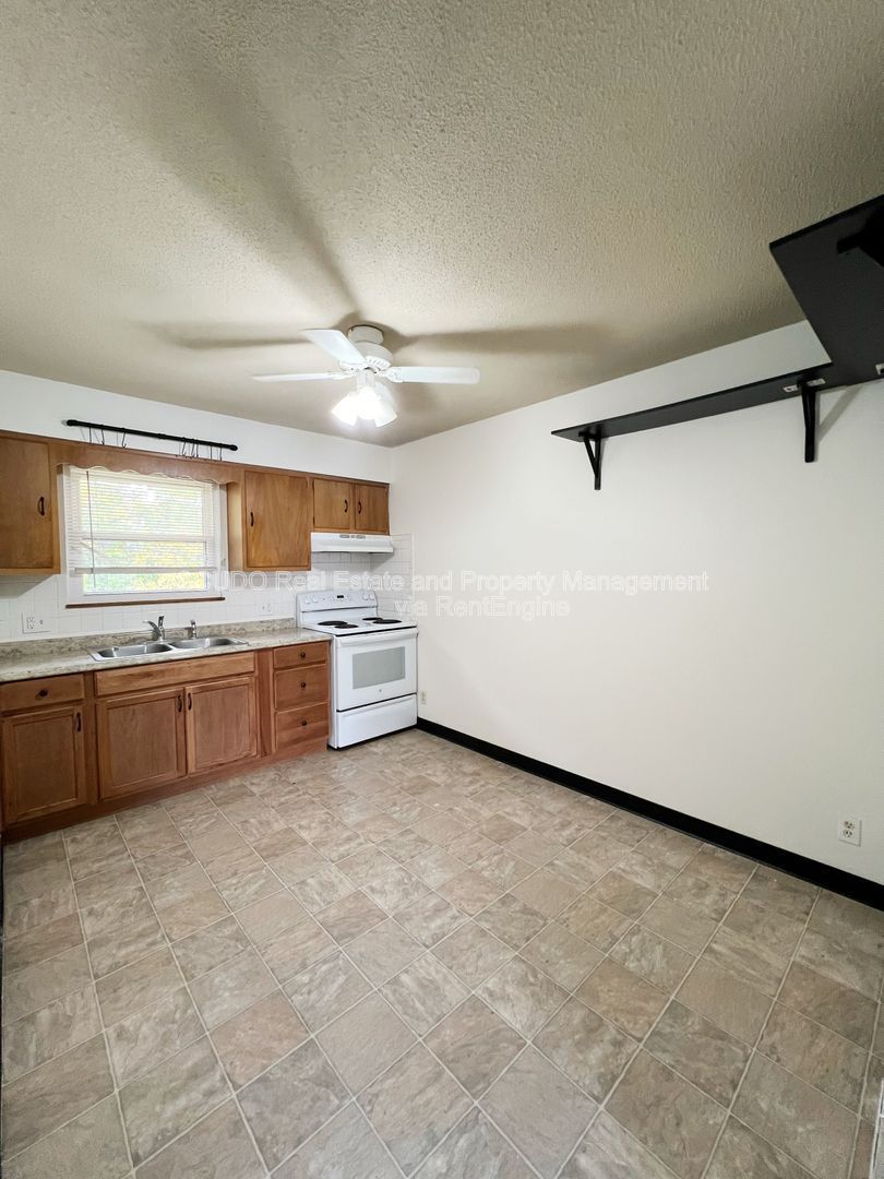 Bright & Cozy 2-Bedroom Home with Large Backyard & Attached Garage! property image