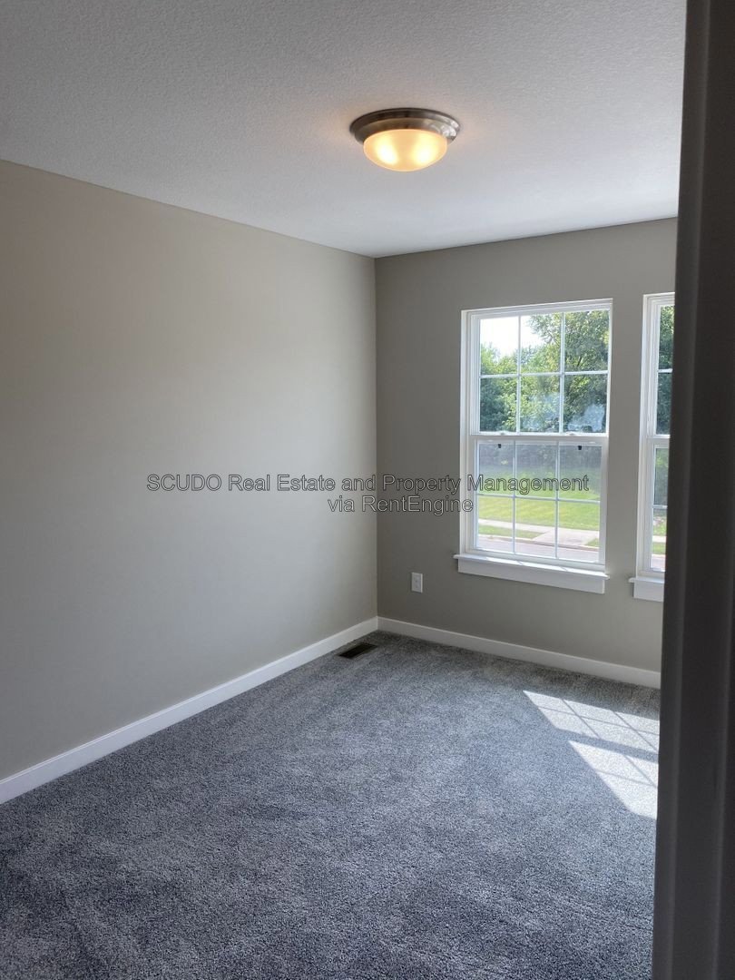 Modern Living, Small-Town Charm | Beautiful Townhome with Garage property image