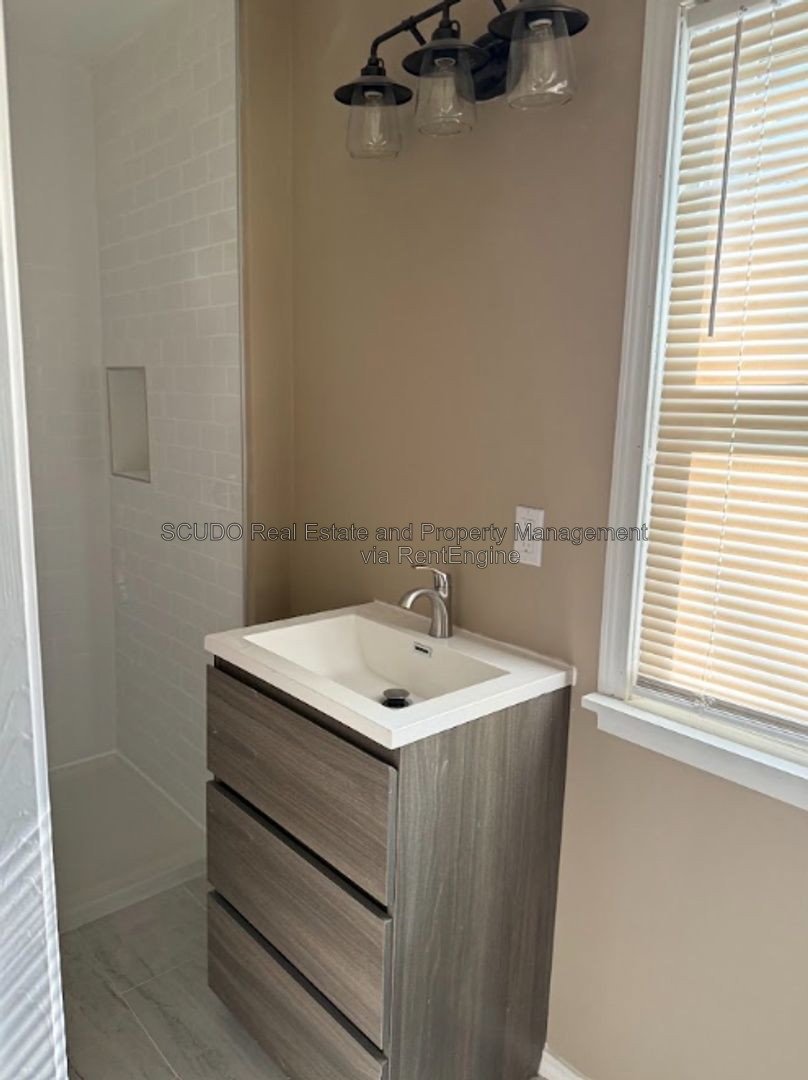 Charming 3-Bedroom Home with Beautiful Wood Floors & Bright Living Spaces property image